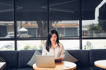 Lifestyle freelance business woman and laptop computer he has throwing document after success the job