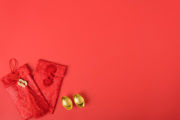 Chinese new year festival concept, flat lay top view, Happy Chinese new year with Red envelope and gold ingot