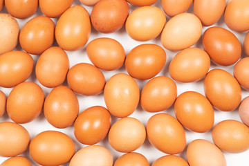 Group of raw brown eggs.