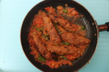 Delicious spicy home made fried kebab with green pepper