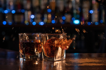 ice splashing into drink