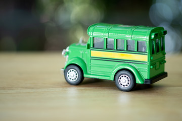 Toy school bus on wood table