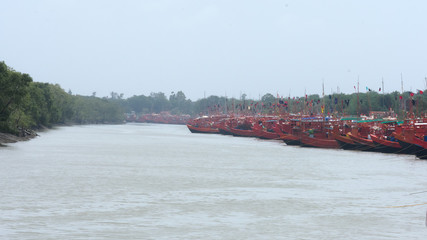 Many Commercial nautical sea vessels like trawler boat ship sailboat, all Red and Black Color code...