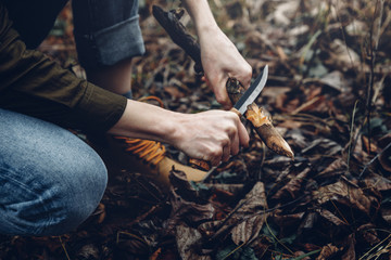 Woman Traveler Plane Knife With Wooden Stick, Hands Close-up. Bushcraft Survival And Scouting Concept