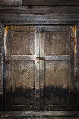Old wood door for abstract wooden door background and texture.
