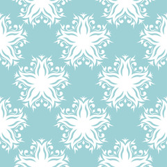 Fototapeta na wymiar Floral seamless pattern. White on blue. Textile background