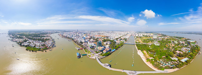 Aerial view Can Tho city skyline from above, Mekong river delta, South Vietnam. Famous tourism destination floating markets. Clear blue sky.