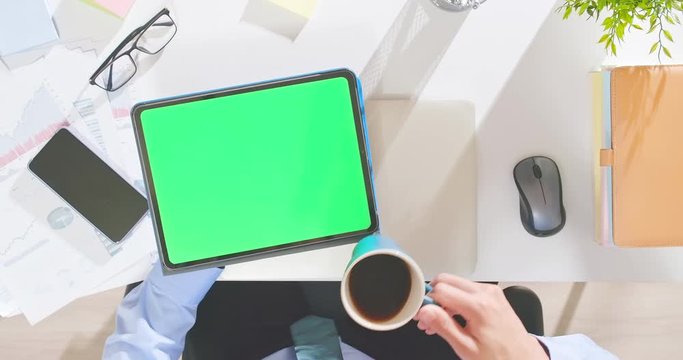 man use green screen tablet