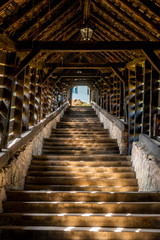Fototapeta premium Scara acoperita in the old town of Sighisoara late afternoon during spring season . One of the most beautiful city which is Unesco sites of the country , Sighisoara , Transylvania , Romania