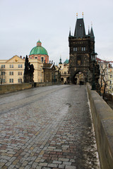 Fototapeta na wymiar Charles Bridge in Prague, Statues, Architectural Buildings, Artworks, Streets