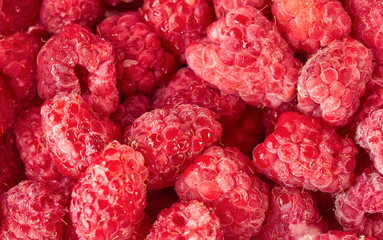Raspberry berries closeup frozen