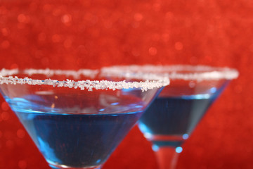 Two glasses with blue drinks