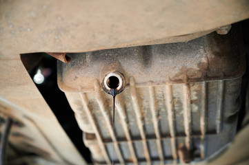 Car repair at a service station. Photo of spare parts and technical units.