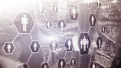 3d Digital composite image of people icons on office buildings background.
