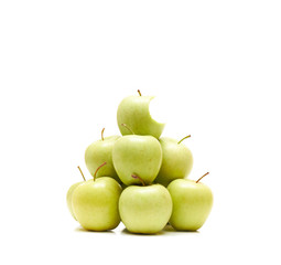 Bitten apple among whole ones