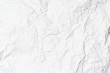 A white crumpled paper texture overlay background
