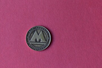Vintage coins, tokens and badges close-up.