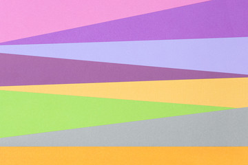 Colorful geometric background is made of multi-colored figures of pastel color.