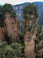  Amazing view of natural quartz sandstone pillar the Avatar Hallelujah Mountain among green woods and rocks in the Tianzi Mountains, the Zhangjiajie National Forest Park, Hunan Province, China.