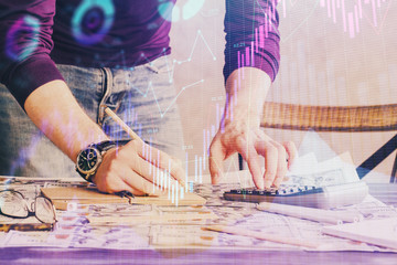 Obraz premium Multi exposure of man standing and planing investment with stock market forex chart.