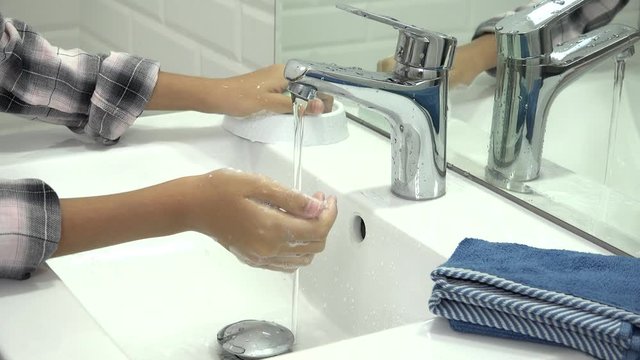 Child Washing Hands in Bathroom, Girl Using Soap and Water, Kids Health Car