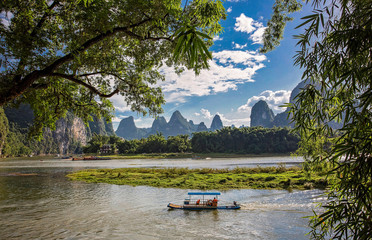 Obraz premium The landscape at the Li River near Yangshou near the city of Guilin in the Province of Guangxi in china in east asia.