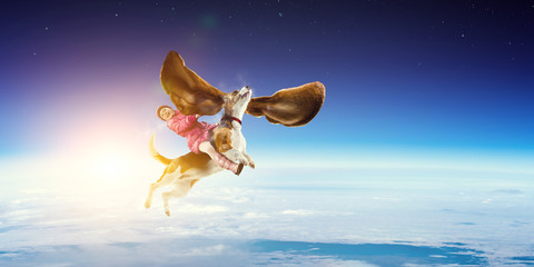 Obraz na płótnie Canvas Super hero and her flying dog