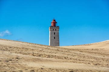 Fototapeta na wymiar Der Leuchtturm Rubjerg Knude in Dänemark