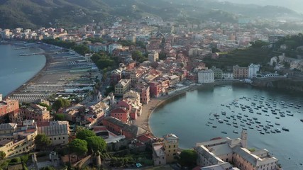 Breathtaking 4K aerial view of Sestri Levante town with incredible turquoise sea