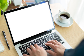 mockup image blank screen computer with white background for advertising text,hand man using laptop contact business search information on desk at home office.marketing and creative design