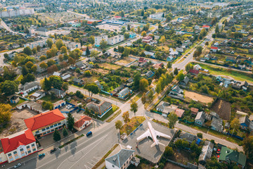 Chachersk, Gomel Region, Belarus. Aerial View Of Skyline Cityscape. Aircraft It Is Mounted On Chassis On One Of Squares Of Town. Historical Heritage In Bird's-eye View