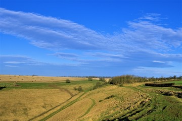 Fototapeta na wymiar Blue sky over Huggate farmland, inn the Yorkshire wolds, East Riding.