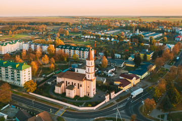 Obraz premium Ruzhany, Brest Region, Belarus. Cityscape Skyline In Autumn Sunny Evening. Bird's-eye View Of And Trinity Church. Famous Historic Landmark