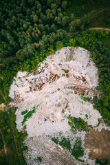 Aerial View Of Domestic Garbage Near Green Forest. Bird's-eye View Of Junk. Domestic Waste In Landfill Junkyard. Eco Concept Garbage Disaster From Ecological Pollution Of Environment