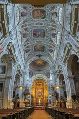 Fototapeta na wymiar Vertical panorama of interior of Dominican Church in Vienna, Austria. Also known as the Church of St. Maria Rotunda, it was built in 1631-1634 in early Baroque style.