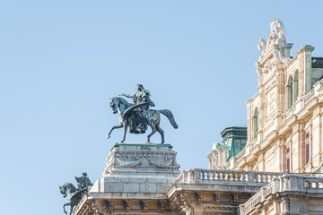 Top roof sculpture of goddess Muse riding Pegasus, a winged horse, at Vienna State Opera House, Vienna, Austria, details, closeup