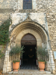 Fototapeta na wymiar Open entrance to the medieval Catholic Church in France