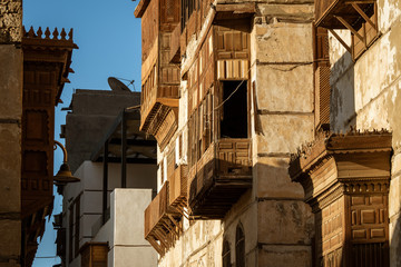 Exterior view of dilapidated traditional residential buildings at the historic district, Al Balad,...
