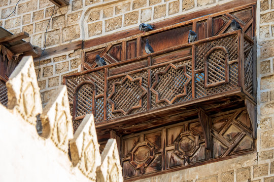 Close-up view of a balcony of a typical coral town house near the Souk al Alawi Street in the historic city center of Al Balad, Jeddah, Saudi Arabia