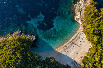 Aerial of secluded paradise beach in mediterranean sea