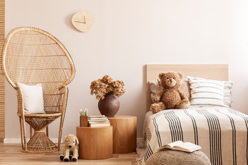 Trendy bedroom interior with wooden furniture and toys in scandinavian style - obrazy, fototapety, plakaty