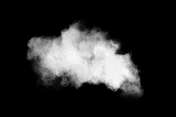 White powder explosion isolated on black background.