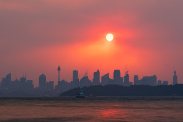 Sydney, Australia - 4th January 2020. The setting sun through the smoke haze of New South Wales...