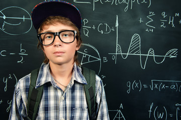 portrait of schoolboy in glasses