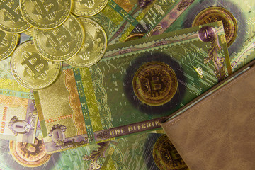 banknote and coin of bitcoin cryptocurrency and leather wallet