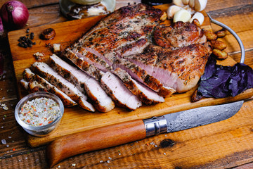 roasted ham composition on a wooden background