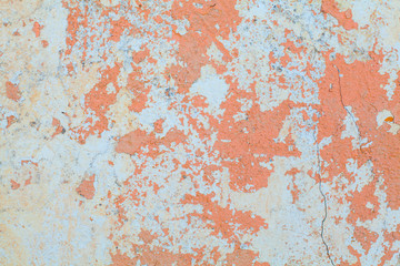White and colorful messy wall stucco texture background. Decorative wall paint.