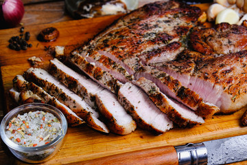 roasted ham composition on a wooden background