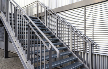 Close up view on metallic stairs at a modern architecture building