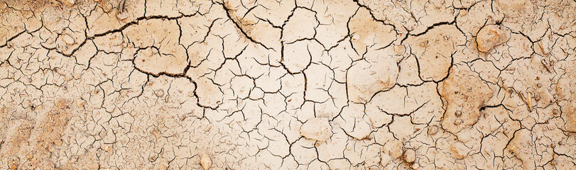 The ground has cracks in the top view for the background or graphic design with the concept of...